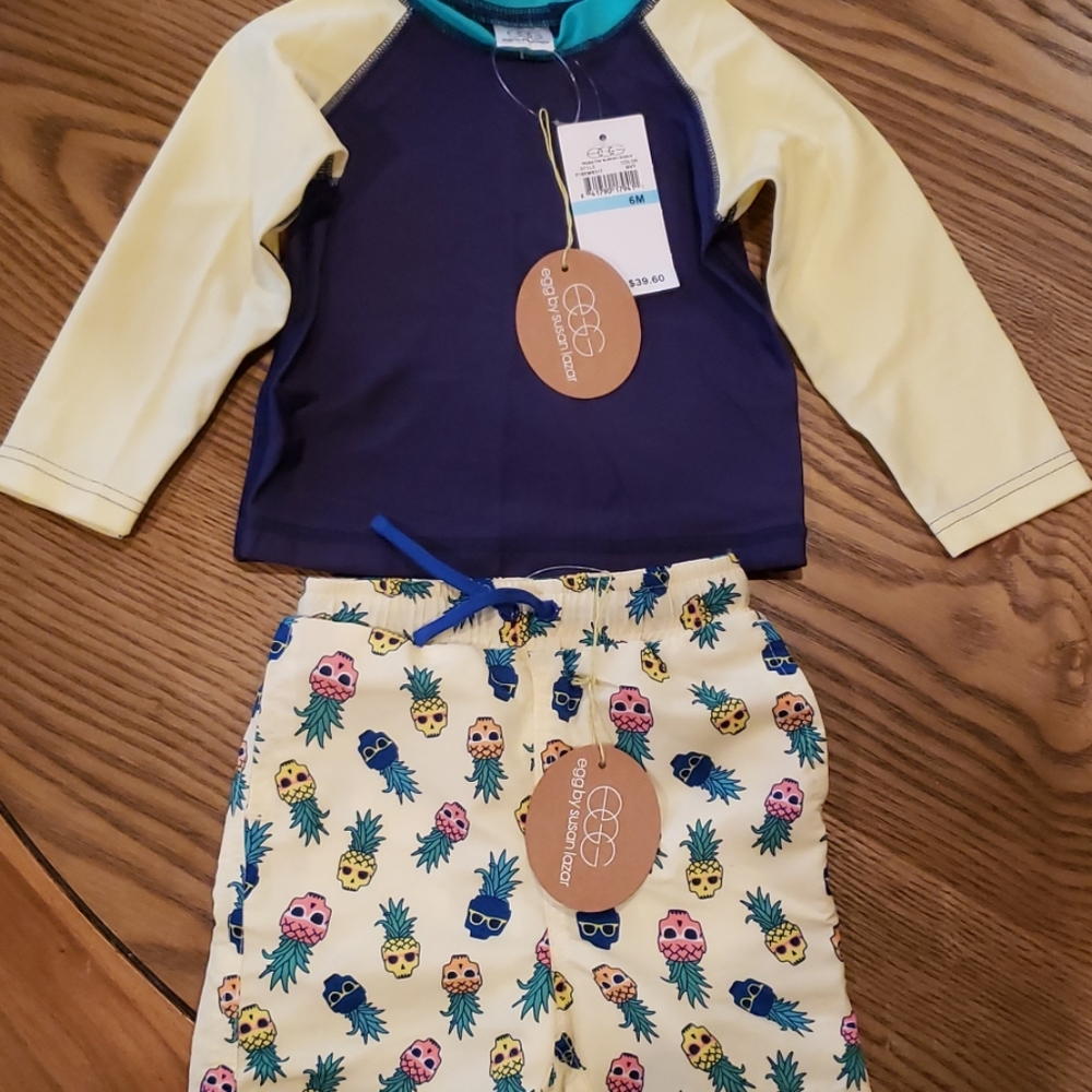 Egg by Susan Lazar Boys Swim Trunks & Rashguard